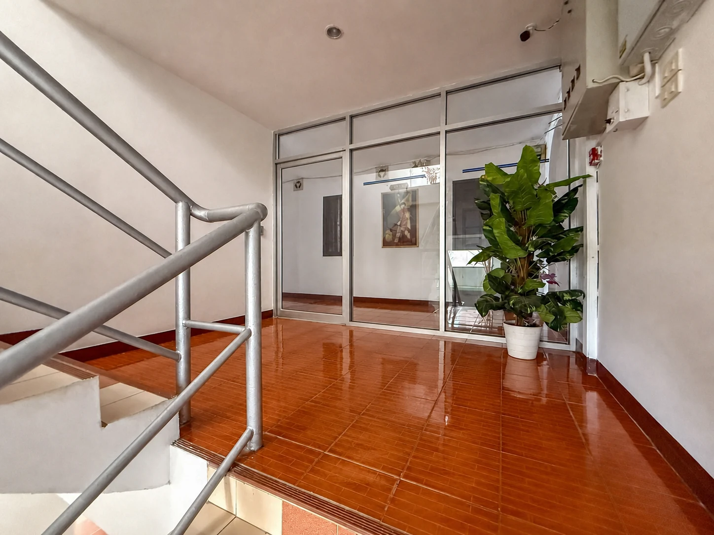 Bright stair landing inside S6 Place